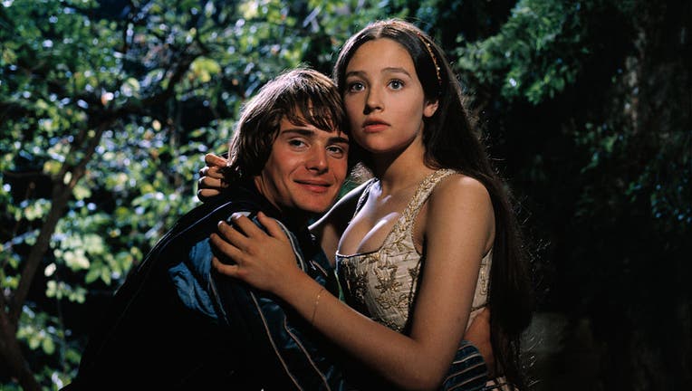 Olivia Hussey and Leonard Whiting Embracing