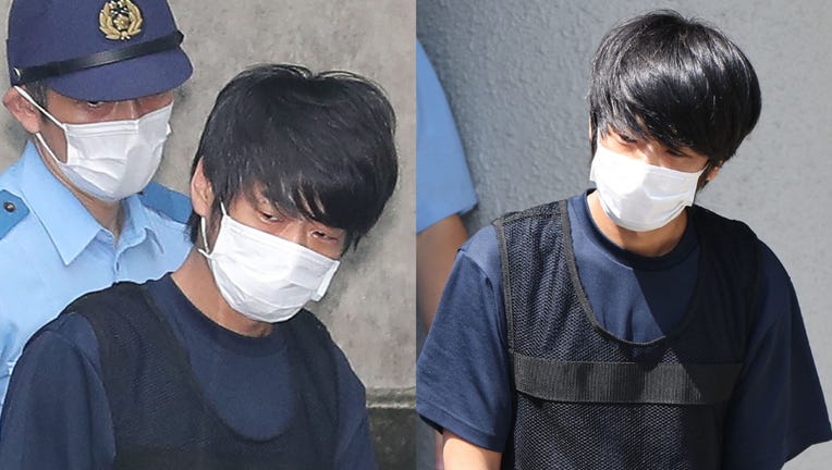 Tetsuya Yamagami, the man accused of murdering former Japanese Prime Minister Shinzo Abe, is transferred from the Nara Nishi police station for a psychiatric examination in Nara on July 25, 2022. (Photo by STR/JIJI PRESS/AFP via Getty Images)