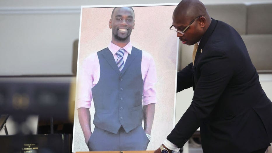 A photo of Tyre Nichols is positioned prior to a press conference on Jan. 27, 2023, in Memphis, Tennessee. (Photo by Scott Olson/Getty Images)