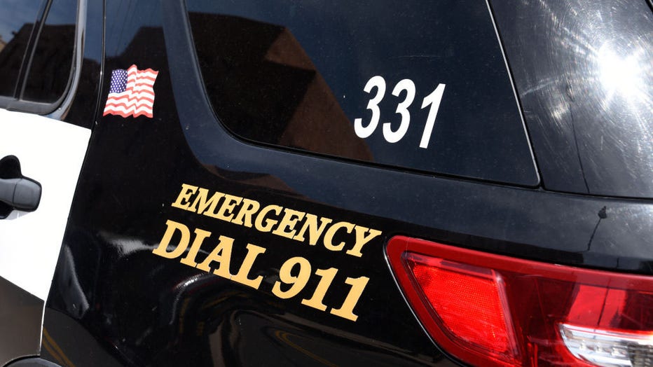 FILE - A police car with 'Emergency Dial 911' on its side parked in Santa Fe, New Mexico. (Photo by Robert Alexander/Getty Images)