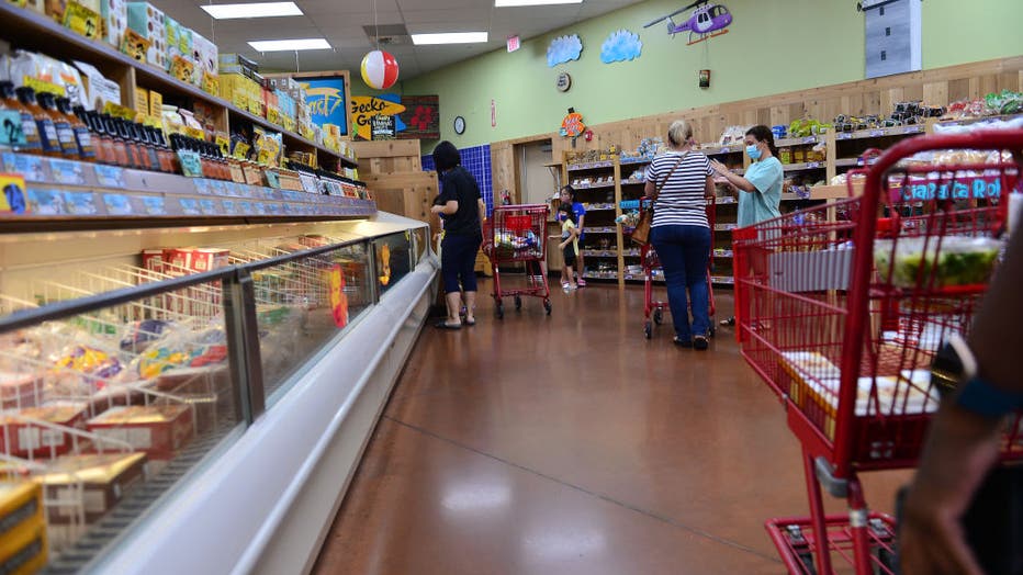 FILE - Customers shop at a Trader Joe's store on July 16, 2020, in Pembroke Pines, Florida. (Photo by Johnny Louis/Getty Images)