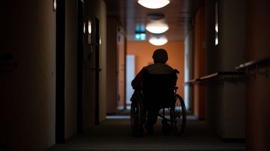 FILE - A woman sits in a wheelchair at a retirement and nursing home. (Photo by Sebastian Gollnow/picture alliance via Getty Images)