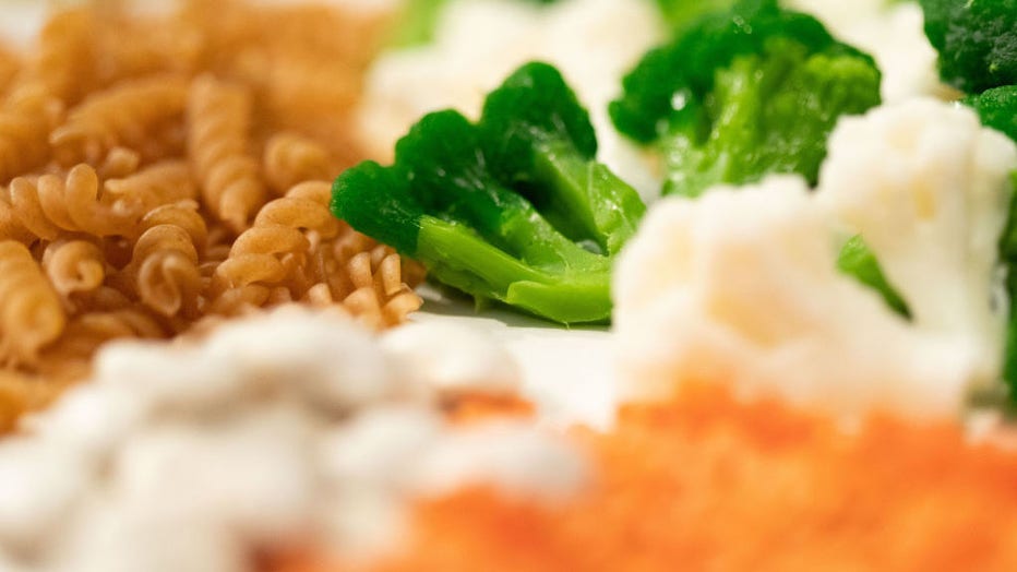 FILE IMAGE - Fruits, vegetables, legumes and whole grains sit on a plate in a file image dated Nov. 13, 2022. (Photo by Friso Gentsch/picture alliance via Getty Images)