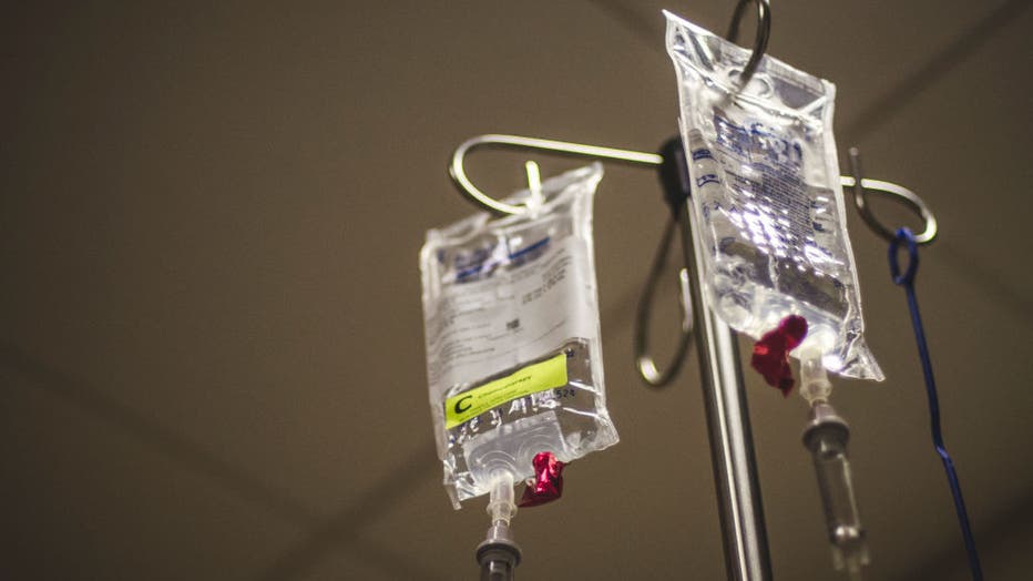 FILE - Chemotherapy drugs are pictured on a hospital IV pole. (Photo by: GHI/Education Images/Universal Images Group via Getty Images)