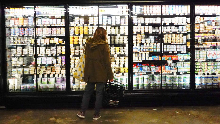 FILE IMAGE - A person shops for groceries at Lincoln Market on March 10, 2022, in the Prospect Lefferts Garden neighborhood of Brooklyn borough in New York City. (Photo by Michael M. Santiago/Getty Images)