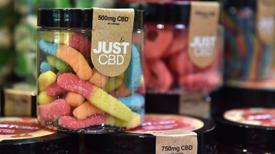 FILE IMAGE - Jars of Cannabidiol CBD sweets are displayed during the Vaper Expo at National Exhibition Centre on Oct. 7, 2022, in Birmingham, England. (Photo by John Keeble/Getty Images)