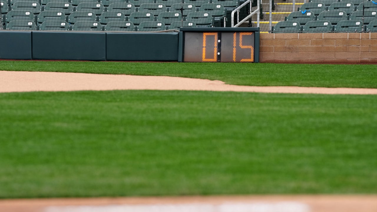A MLB baseball rests on the mound prior the spring training game