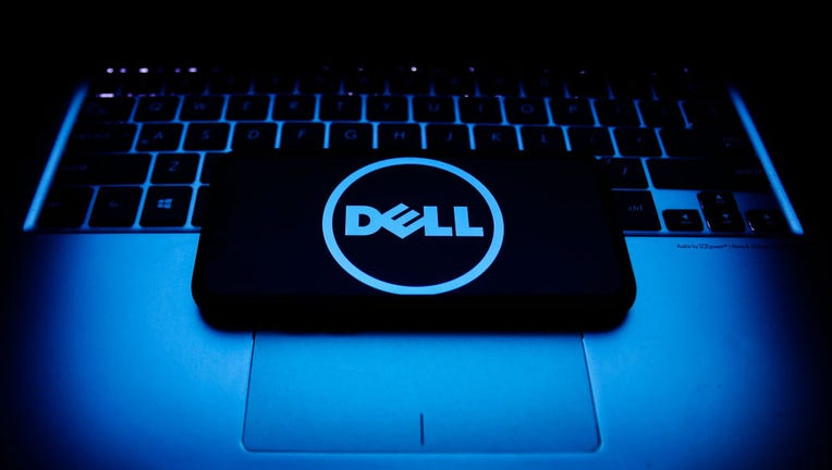 FILE - Dell logo displayed on a phone screen and a laptop keyboard are seen in this illustration photo taken in Krakow, Poland on Oct. 30, 2021. (Photo by Jakub Porzycki/NurPhoto via Getty Images)