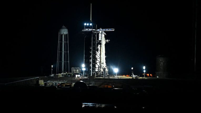 The SpaceX Falcon 9 rocket with the company's Crew Dragon spacecraft vents fuel prior to a scrubbed launch from pad 39A for the Crew-6 mission at NASA's Kennedy Space Center in Cape Canaveral, Florida, on Feb. 27, 2023. (Photo by CHANDAN KHANNA/AFP via Getty Images)