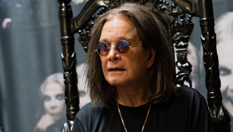 FILE - Musician Ozzy Osbourne signs copies of his album "Patient Number 9" at Fingerprints Music on Sept. 10, 2022, in Long Beach, California. (Photo by Scott Dudelson/Getty Images)