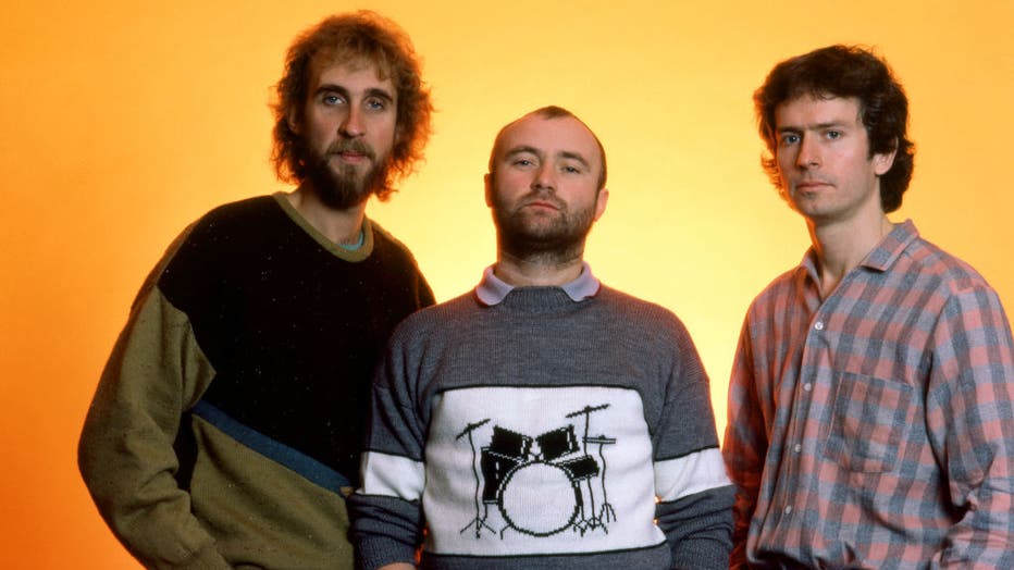 English guitarist Mike Rutherford, English drummer and singer Phil Collins and English musician and keyboardist Tony Banks of the English rock band Genesis pose for a studio portrait during the 1983 Mama Tour on November 14, 1983, at the Joe Louis Arena in Detroit, Michigan. (Photo by Ross Marino/Getty Images)