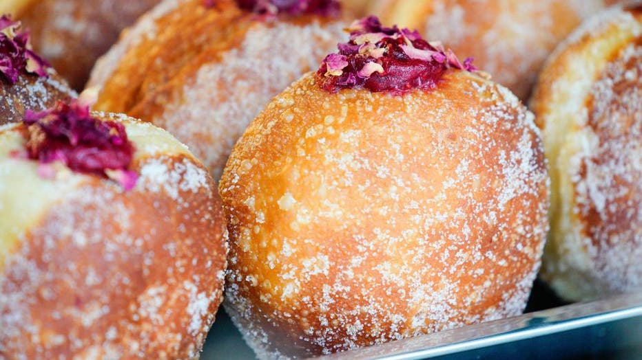 Polish fried donuts, or Paczki, are seen in a window display at a bakery in Warsaw, Poland, on Feb. 11, 2021. (Xinhua/Jaap Arriens via Getty Images)