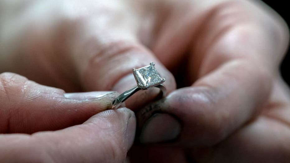 FILE - A finished and ready-for-client princess cut diamond engagement ring at a shop in central London. Picture date: April 1, 2022. (Photo by Aaron Chown/PA Images via Getty Images)