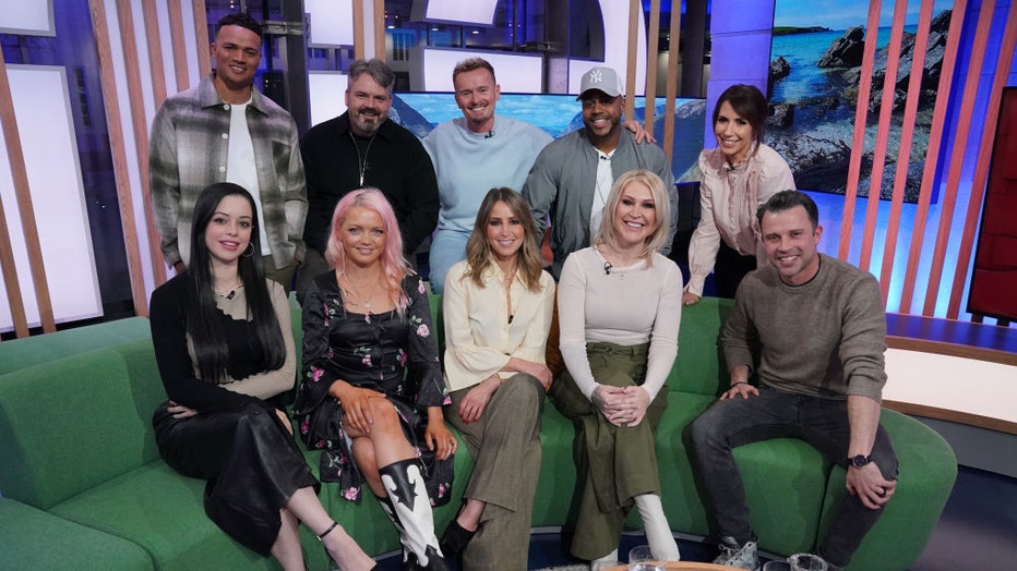 Presenters Jermaine Jenas (back left) and Alex Jones (back right) with (left to right) Tina Barrett, Paul Cattermole, Hannah Spearritt, Jon Lee, Rachel Stevens, Bradley McIntosh and Jo O'Meara, of S Club 7 and actor Neil McDermott during filming for The One Show in London. S Club 7 have announced they are reuniting for a UK tour later this year in celebration of their 25th anniversary. (Photo by Jonathan Brady/PA Images via Getty Images)