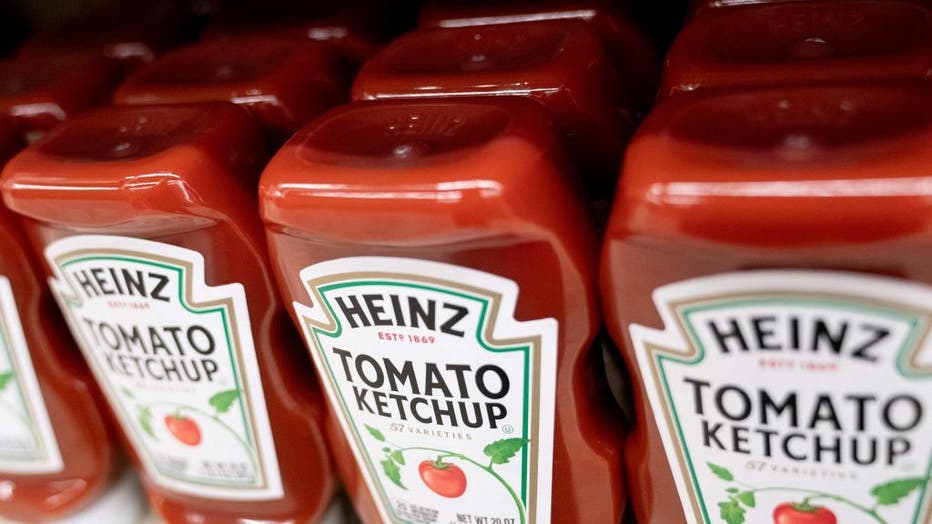 FILE IMAGE - Heinz ketchup is displayed on a shelf at a grocery store in Washington, DC, on Feb. 15, 2023. (Photo by STEFANI REYNOLDS/AFP via Getty Images)