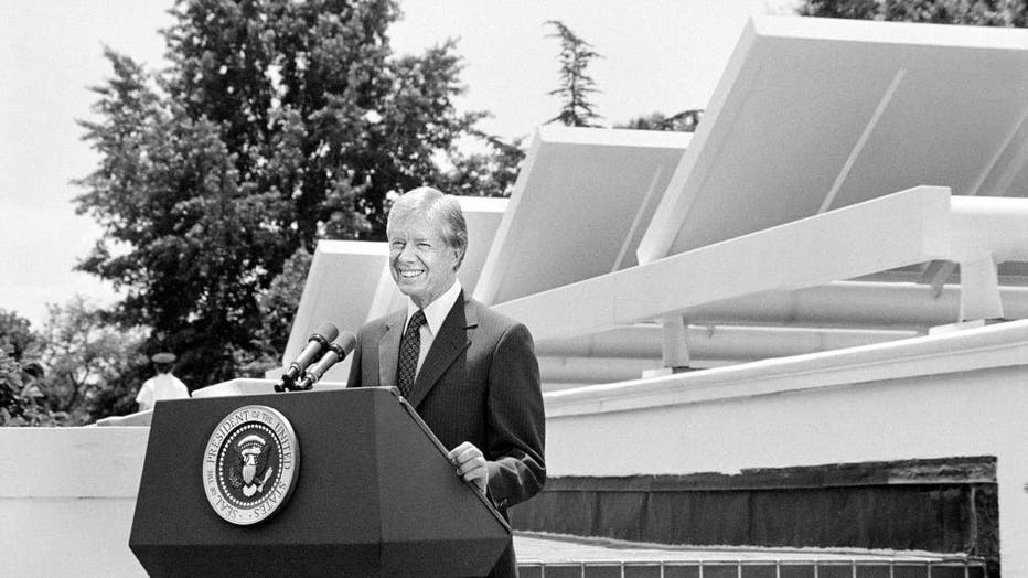 U.S. President Jimmy Carter speaking in front of Solar Panels placed on West Wing Roof of White House, announcing his solar energy policy, Washington, DC, June 20, 1979. (Photo by: Universal History Archive/Universal Images Group via Getty Images)