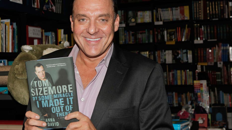 Tom Sizemore signs copies of his new book "By Some Miracle I Made It Out Of There" at Book Soup on April 9, 2013 in West Hollywood, California. (Photo by Tibrina Hobson/WireImage)