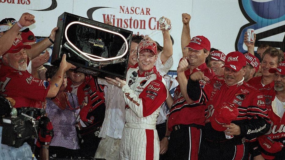 NASCAR Pepsi 400, Dale Earhardt Jr, victorious with the trophy after a race in Daytona, FL, on July 7, 2001. (Photo by Bob Rosato/Sports Illustrated via Getty Images)