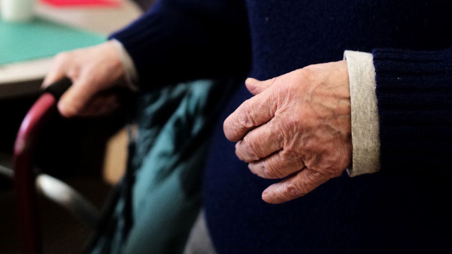 FILE - A visitor to the Kingston Council On Aging makes their way to a lunch table on Jan. 25, 2018, in Kingston, Massachusetts. (Photo by Jonathan Wiggs/The Boston Globe via Getty Images)