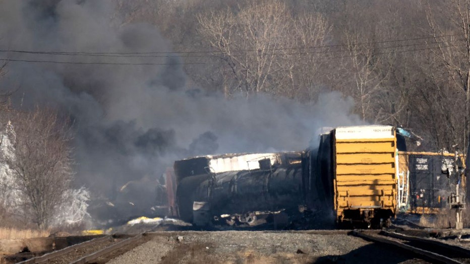 Smoke rises from a derailed cargo train in East Palestine, Ohio, on Feb. 4, 2023. (Photo by DUSTIN FRANZ/AFP via Getty Images)