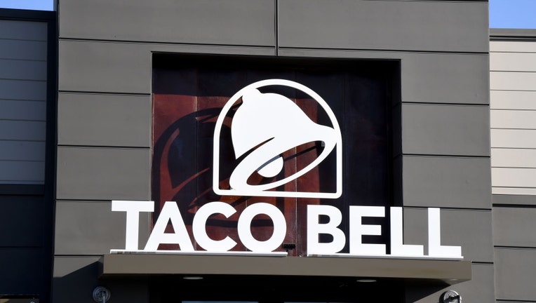 FILE - An exterior view shows a sign at a Taco Bell restaurant on March 30, 2020 in Las Vegas, Nevada. (Photo by Ethan Miller/Getty Images)