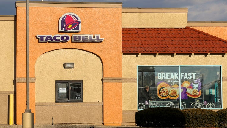 FILE - View of a Taco Bell restaurant sign and logo. (Photo by Paul Weaver/SOPA Images/LightRocket via Getty Images)