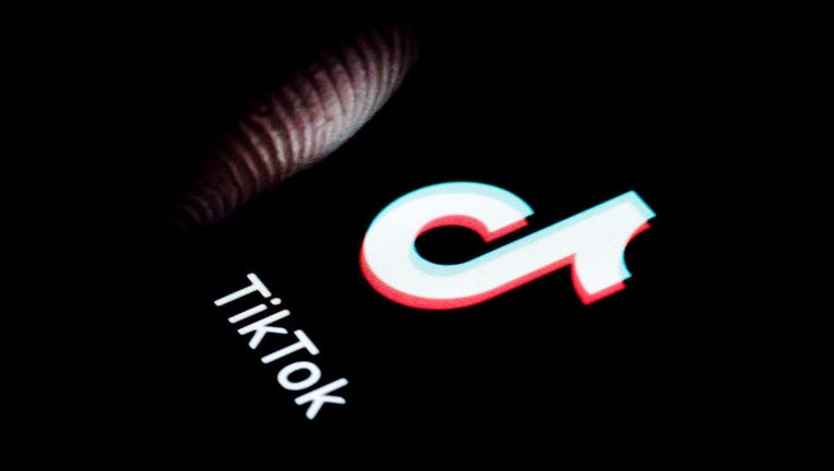 FILE - The logo of TikTok App is seen on a smartphone. (Photo by Thomas Trutschel/Photothek via Getty Images)