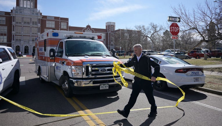 Police investigate at Denvers East High School after a shooting there on Wednesday, March 22, 2023. (Photo by Hyoung Chang/The Denver Post)
