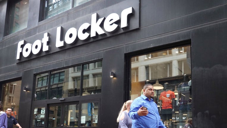 FILE - A sign hangs above the entrance of a Foot Locker store on Aug. 2, 2021, in Chicago, Illinois. (Photo by Scott Olson/Getty Images)