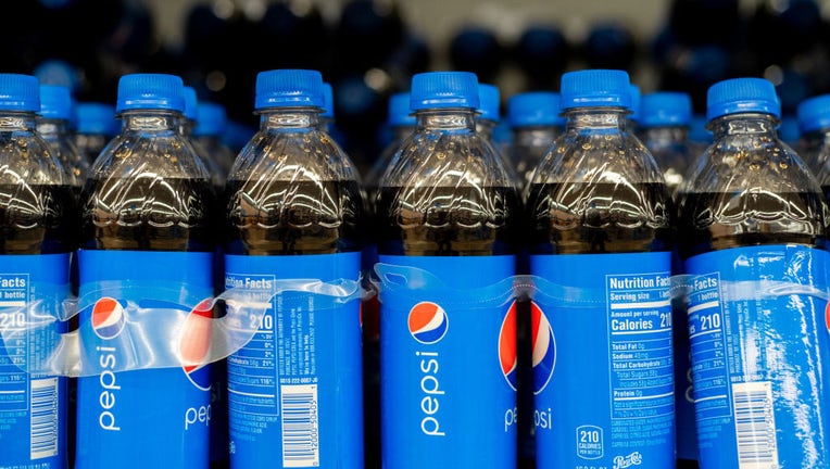 FILE - Pepsi sodas displayed on shelves at a Walmart Supercenter on Dec. 6, 2022, in Austin, Texas. (Photo by Brandon Bell/Getty Images)
