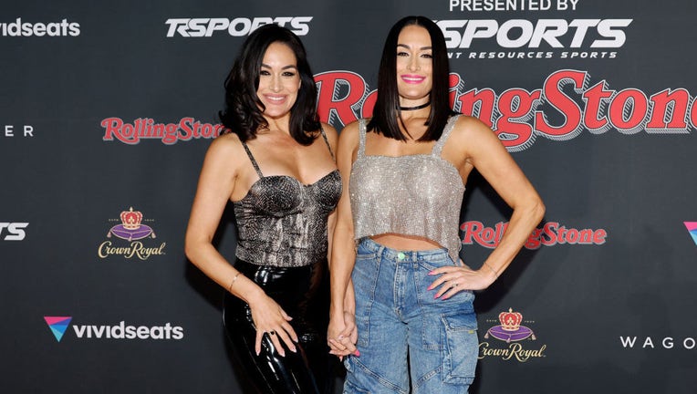 FILE - (L-R) Brie Bella and Nikki Bella attend the 2023 Rolling Stone Super Bowl Party at The Clayton House on Feb. 10, 2023, in Scottsdale, Arizona. (Photo by Mike Coppola/Getty Images)