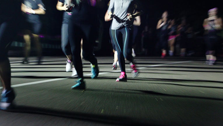 FILE - Runners make their way around the 13km course during Nike She Runs The Night at Centennial Park on May 3, 2012, in Sydney, Australia. (Photo by Marianna Massey/Corbis via Getty Images)