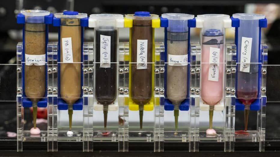 The 3D-printing system that constructs a dish comprising seven ingredients, cooked in situ using a laser. Credit: Provided / Jonathan Blutinger/Columbia Engineering