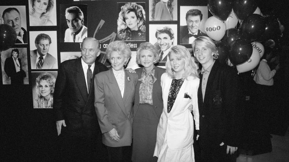 THE YOUNG AND THE RESTLESS. November 15, 1988. 4000th episode party. Left to right: Y&amp;R Co-Creator William J. Bell, Jeanne Cooper (portrays Katherine Chancellor), Y&amp;R Co-Creator Lee Phillip Bell, Lauralee Bell (portrays Christine Blair) and Brad Bell (future Executive Producer and Head Writer-The Bold and the Beautiful). Hollywood, CA. (Photo by CBS via Getty Images)