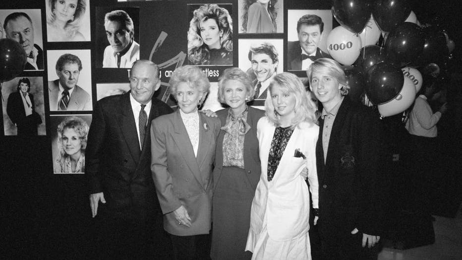 THE YOUNG AND THE RESTLESS. November 15, 1988. 4000th episode party. Left to right: Y&R Co-Creator William J. Bell, Jeanne Cooper (portrays Katherine Chancellor), Y&R Co-Creator Lee Phillip Bell, Lauralee Bell (portrays Christine Blair) and Brad Bell (future Executive Producer and Head Writer-The Bold and the Beautiful). Hollywood, CA. (Photo by CBS via Getty Images)