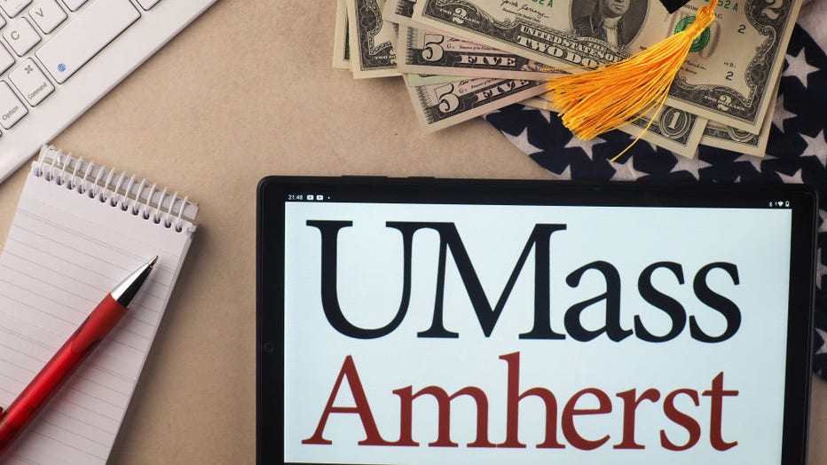 In this photo illustration, the University of Massachusetts, Amherst logo seen displayed on a tablet. (Photo Illustration by Igor Golovniov/SOPA Images/LightRocket via Getty Images)