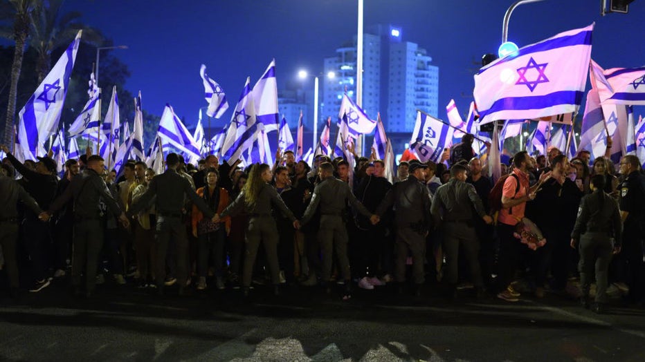 Thousands of Israeli protesters rally against Israeli Governments judicial overhaul bills in Raanana on March 27, 2023. Protesters confronted with Police and blocked main roads. (Photo by Gili Yaari/NurPhoto via Getty Images)