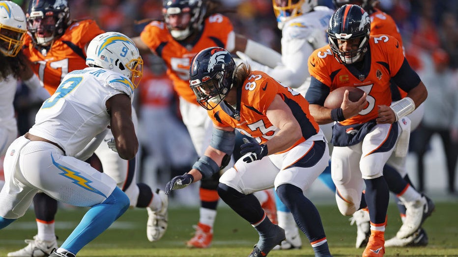 FILE - Russell Wilson #3 of the Denver Broncos runs the ball during the first quarter against the Los Angeles Chargers at Empower Field At Mile High on Jan. 8, 2023, in Denver, Colorado. (Photo by Matthew Stockman/Getty Images)