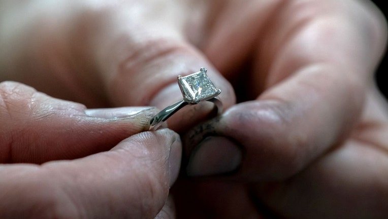 FILE - A princess cut diamond engagement ring is pictured in a file image dated April 1, 2022. (Photo by Aaron Chown/PA Images via Getty Images)