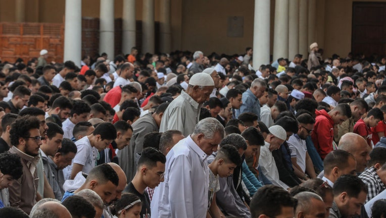 Muslims gather to perform the Eid al-Fitr prayer at Amr ibn al-As Mosque during the first day of the Eid al-Fitr in historical center Fustat of Cairo, Egypt on April 21, 2023. Eid al-Fitr marks the end of Ramadan, the Muslim holy month of fasting. (Photo by Mohamed El-Shahed/Anadolu Agency via Getty Images)