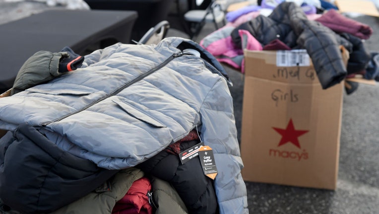 FILE - Donation coats sit outside on Dec. 22, 2020, in Reading, Pennsylvania. (Photo by Ben Hasty/MediaNews Group/Reading Eagle via Getty Images)