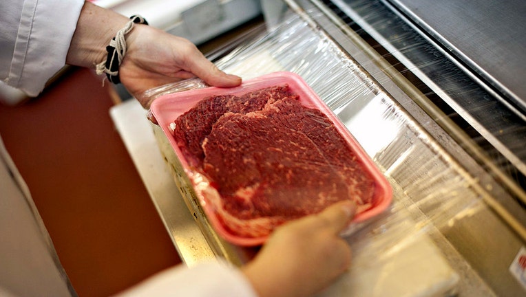 FILE - Tenderized tip steak is packaged in the meat department of a supermarket in Princeton, Illinois, U.S., on April 26, 2012. Photographer: Daniel Acker/Bloomberg via Getty Images