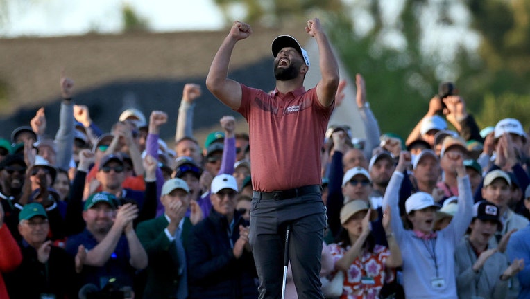Jon Rahm of Spain celebrates holing the winning putt on the 18th green during the final round of the 2023 Masters Tournament at Augusta National Golf Club on April 9, 2023, in Augusta, Georgia. (Photo by David Cannon/Getty Images)