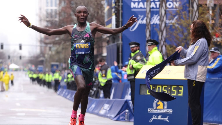 Evans Chebet of Kenya crosses the finish line and takes first place in the professional Mens Division during the 127th Boston Marathon on April 17, 2023, in Boston, Massachusetts. (Photo by Maddie Meyer/Getty Images)