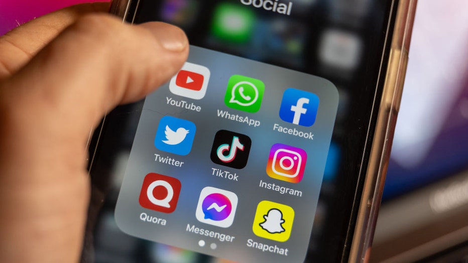 FILE - In this photo illustration, the logos of TikTok, YouTube, instant messaging software Whatsapp Facebook, Twitter, Instagram, Quora, Facebook Messenger and Snapchat are pictured on March 16, 2023. (Photo by Matt Cardy/Getty Images)