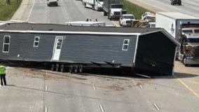 Watch: Mobile home slides off truck, blocks traffic on North Carolina highway