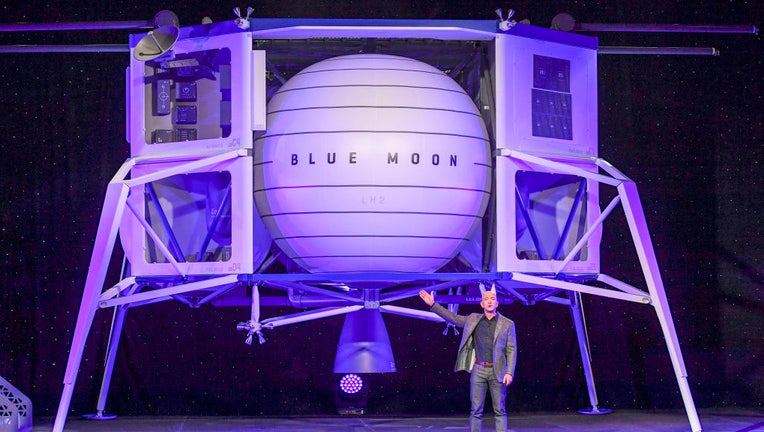 FILE - Jeff Bezos, founder of Amazon, Blue Origin and owner of The Washington Post via Getty Images, introduces their newly developed lunar lander "Blue Moon" and gives an update on Blue Origin and the progress and vision of going to space to benefit Earth at the Walter E. Washington Convention Center. (Photo by Jonathan Newton / The Washington Post via Getty Images)