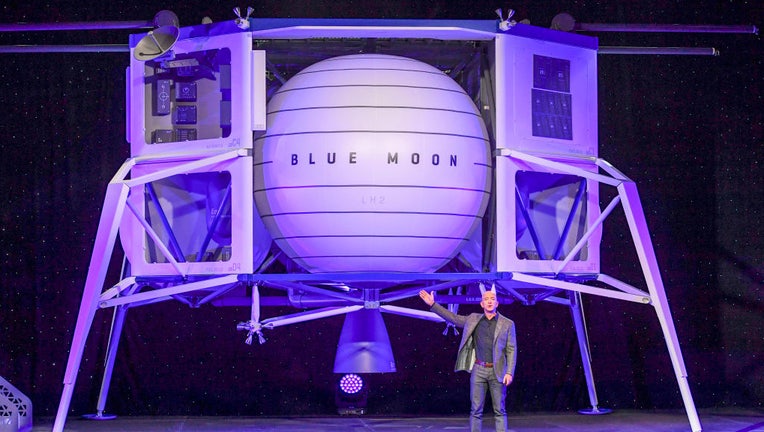 FILE - Jeff Bezos, founder of Amazon, Blue Origin and owner of The Washington Post via Getty Images, introduces their newly developed lunar lander "Blue Moon" and gives an update on Blue Origin and the progress and vision of going to space to benefit Earth at the Walter E. Washington Convention Center. (Photo by Jonathan Newton / The Washington Post via Getty Images)
