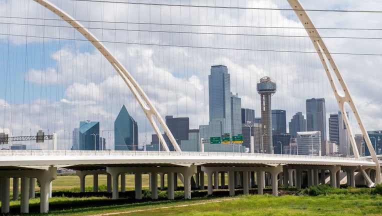 FILE - View of the Dallas skyline through the Horseshoe highway built to upgrade the congested interchange in downtown Dallas, Texas, on July 21, 2020. (Photo by VALERIE MACON/AFP via Getty Images)