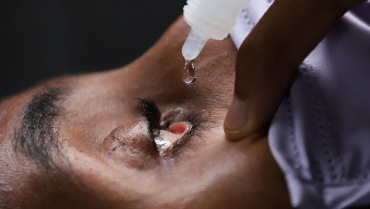 FILE - Eye drops are put into a patients eye in a file image dated June 30, 2021. (Photo by Michael Tewelde/Xinhua via Getty Images)